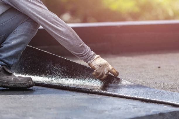 Professional Emergency Waterproofing technician working in Matthews, NC